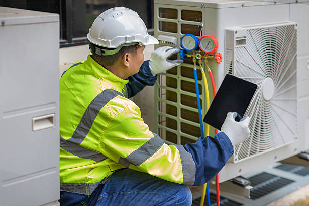 Professional Heat Pump Repair technician working in Lumberton, NC